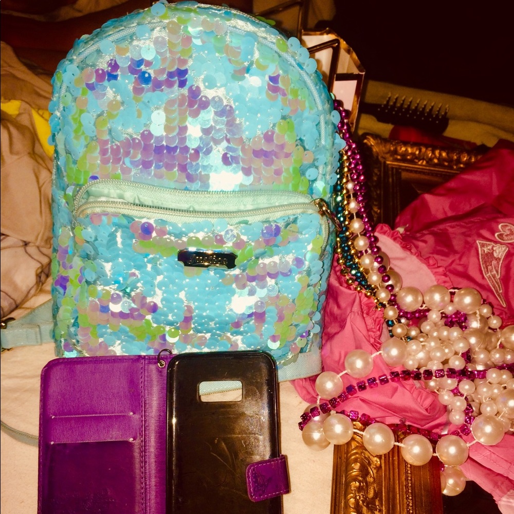 Sequence justice backpack, phone wallet keys,beads
